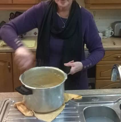 Margaret in her kitchen.