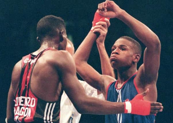 Floyd Mayweather jr, right, at the Atlanta Olympics in 1996, where he  lost in the semi-finals when a hugely controversial decision went in favour of eventual silver medallist Serafim Todorov of Bulgaria. Picture: AFP/Getty