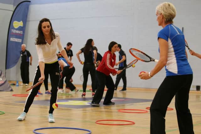 The Duchess of Cambridge playing tennis with Andy Murray's mother Judy at Craigmount High School in Edinburgh. Picture: PA
