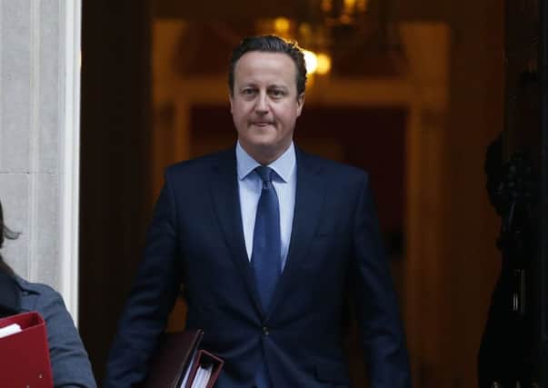 David Cameron leaves No 10 ahead of Prime Ministers Questions as the internal warfare within the Conservative Party heated up. Picture: AP