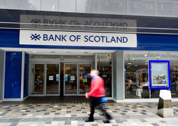 Bank of Scotland's parent saw profits fall as it set aside more funds to deal with mis-sold PPI. Picture: John Devlin