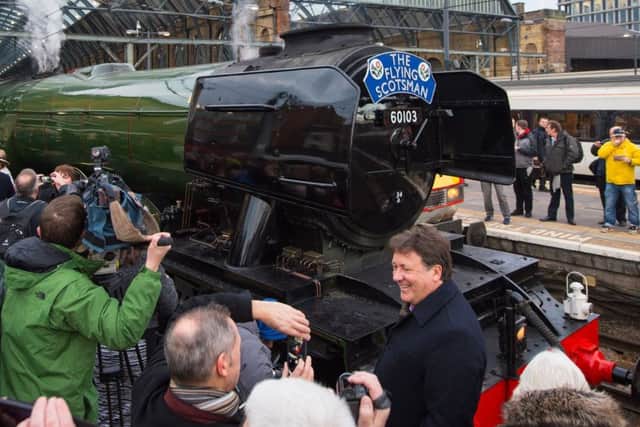 Crowds gather at London King's Cross on February 25 to see the Flying Scotsman before its inaugural passenger service following a 10-year refit. Picture: Dominic Lipinski/PA Wire