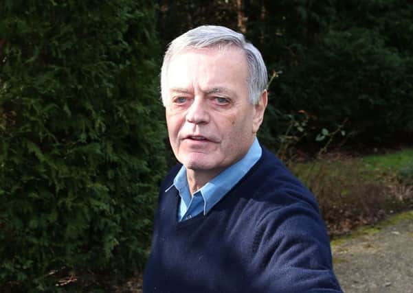 Tony Blackburn arrives at his home and hands a statement to the press on February 25, 2016 in Barnet, England. Picture: Getty Images