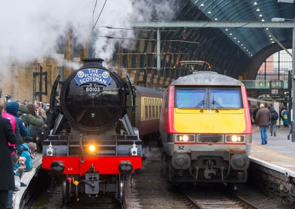 The famous steam locamotive Flying Scotsman left London's King's Cross station on its inaugural journey. Picture: PA