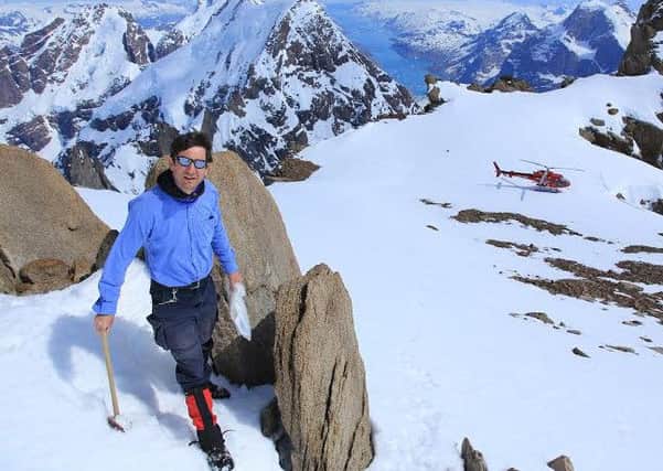 Dr Adrian Finch of St Andews University, pictured here working on mineral exploration in south east Greenland.