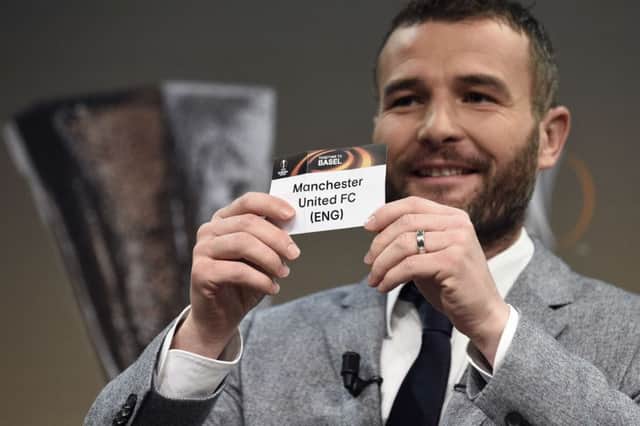 Former Swiss forward and this year's UEFA Europa League final ambassador Alexander Frei draws Manchester United. Picture: AFP/Getty