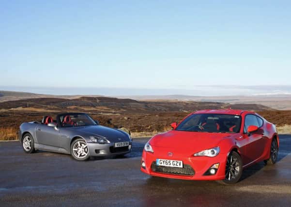 1999 Honda S2000 (silver) and 2016 Toyota GT86 Primo (red)