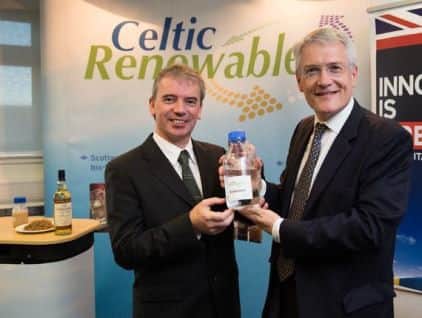 Martin Tangney, left, of Celtic Renewables with transport minister Andrew Jones MP. The spin-out business converts by-products from the Scotch whisky industry into biofuel
