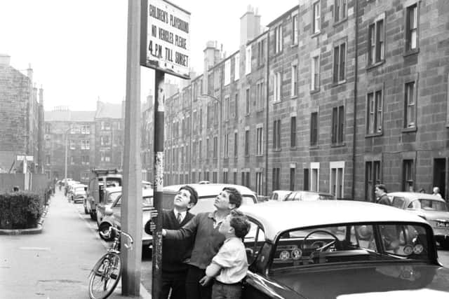 Children can play in safety in Caledonian Place, Dalry after a Children's Playground - No Vehicles After 4pm rule was introduced in August 1966.