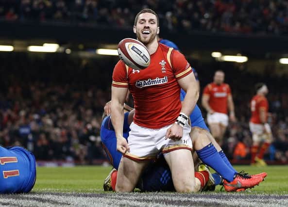 Wales wing George North celebrates scoring his side's try in the win against France. Picture: Adrian Dennis/AFP/Getty Images