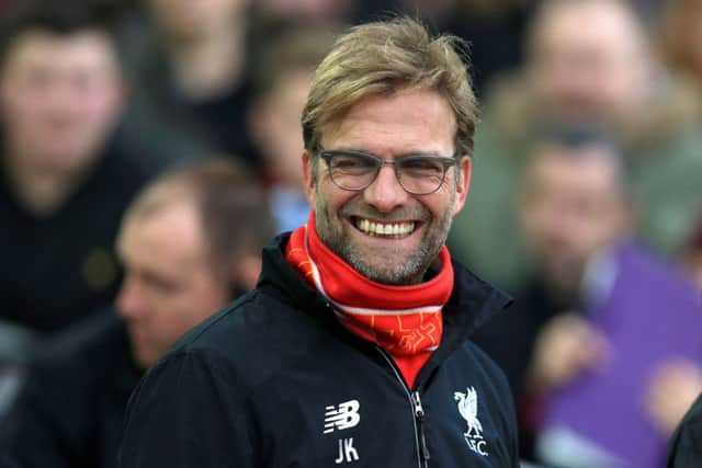 Jurgen Klopp won trophies with Borussia Dortmund and is looking for his first with Liverpool in Sunday's Capital One Cup final against Manchester City. Picture: Adam Davy/PA Wire