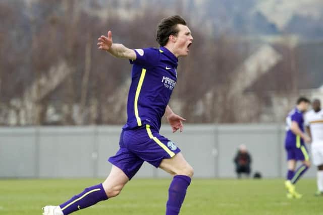 Hibernian's Liam Henderson celebrates having pulled a goal back for his side. Picture: SNS