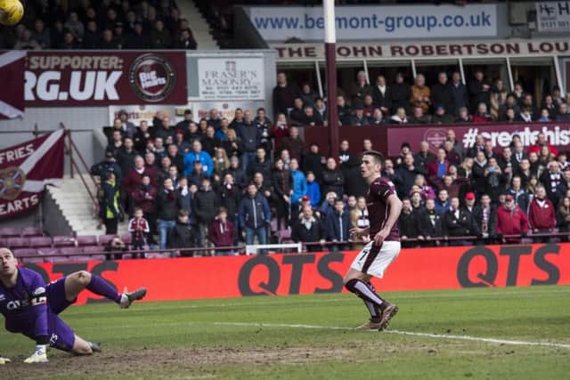 Hearts' Jamie Walker puts away the rebound after his unsuccesful penalty kick. Picture SNS