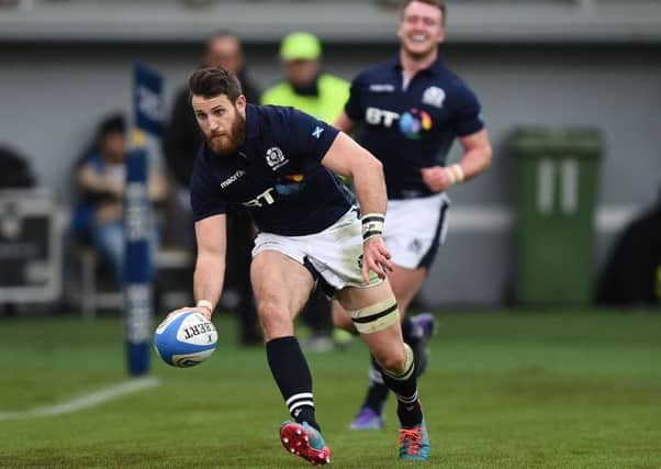 Tommy Seymour runs in to score Scotland's third try in the win over Italy. Picture: Andrew Matthews/PA Wire