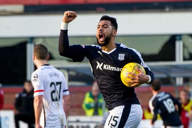 Dundee's Kane Hemmings celebrates his goal. Picture: SNS