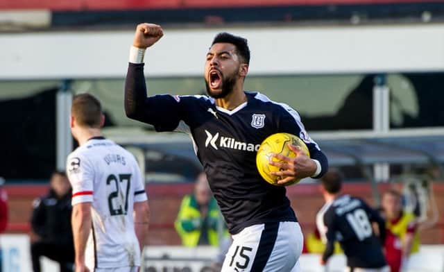 Dundee's Kane Hemmings celebrates his goal. Picture: SNS