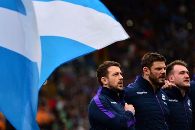 Greig Laidlaw leads his team singing the anthem prior to the  match against Italy.  Picture: Dan Mullan/Getty Images