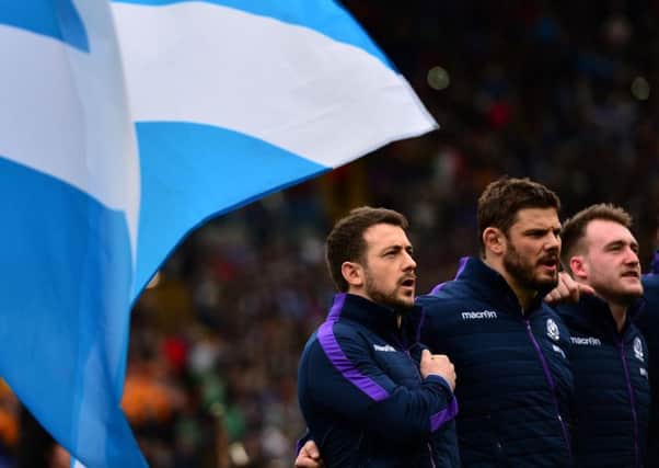 Greig Laidlaw leads his team singing the anthem prior to the  match against Italy.  Picture: Dan Mullan/Getty Images