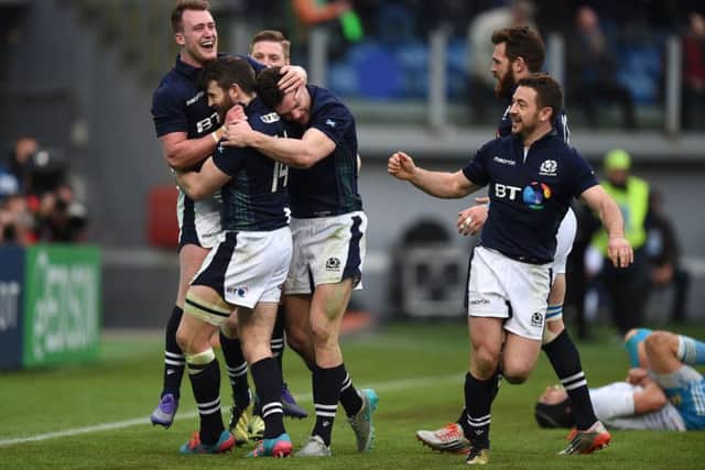 Tommy Seymour is congratulated after his late try sealed the win. Picture: SNS