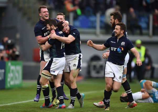 Tommy Seymour is congratulated after his late try sealed the win. Picture: SNS