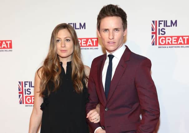 Eddie Redmayne with wife Hannah Bagshawe at a pre-Oscars party. Picture: AP