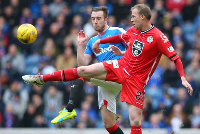 Rangers defender Danny Wilson, left, vies with David Clarkson of St Mirren at Ibrox on Saturday. Picture: Getty