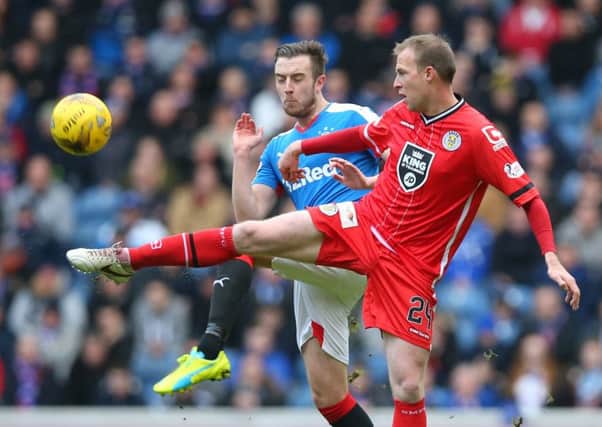 Rangers defender Danny Wilson, left, vies with David Clarkson of St Mirren at Ibrox on Saturday. Picture: Getty