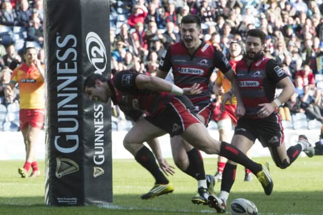 Edinburgh's Phil Burleigh goes over for a try. Picture: SNS