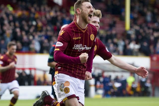 Lewis Moult (centre) celebrates after scoring Motherwell's first goal. Picture: SNS