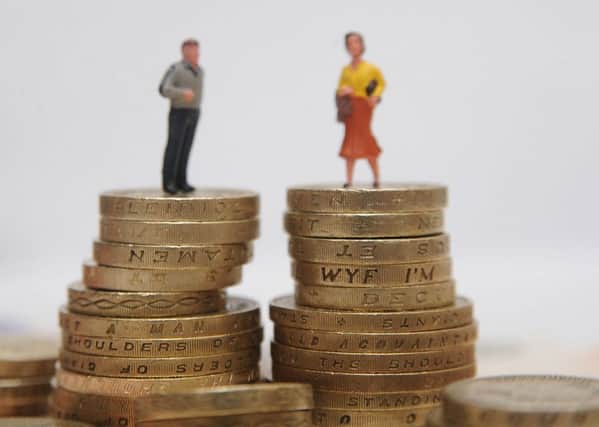 The Equal Pay Act 1970 was implemented in 1975. Despite that, official statistics show, on average, women still earn 19 per cent less than men. Picture: PA