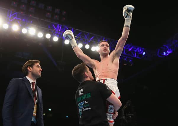 Josh Taylor celebrates after victory over Lyes Chaibi in the Super-Lightweight Contest at Manchester Arena. Picture: Getty