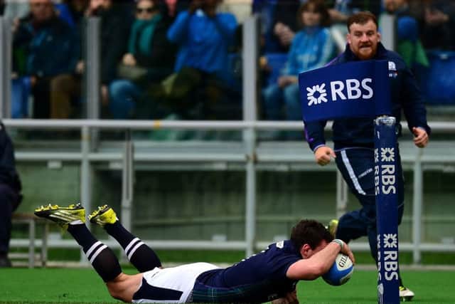 John Hardie of Scotland goes over for his side's second try against Italy. Picture: Getty