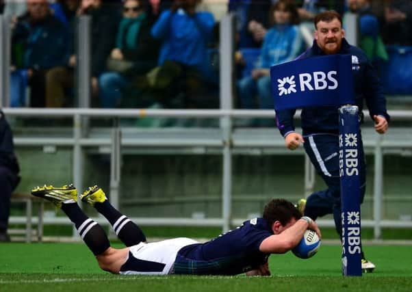 John Hardie of Scotland goes over for his side's second try against Italy. Picture: Getty