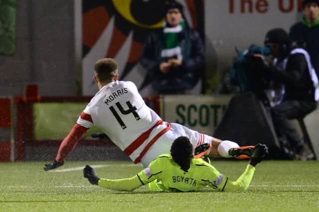 Dedryck Boyata was sent off for a challenge on Hamilton's Carlton Morris. Picture: SNS