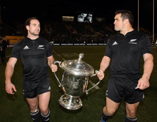 Corey Flynn (right), pictured with Alby Mathewson after a victorious Bledisloe Cup match in 2010, played 15 Tests for New Zealand. Picture: Getty
