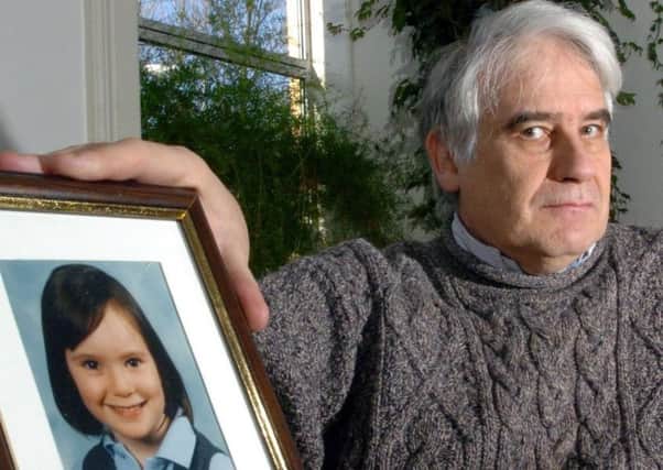 Mick North with a photograph of his daughter Sophie. Picture: PA