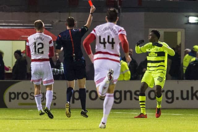 The Celtic defender was given his marching orders for a challenge on Hamilton's Carlton Morris. Picture: SNS