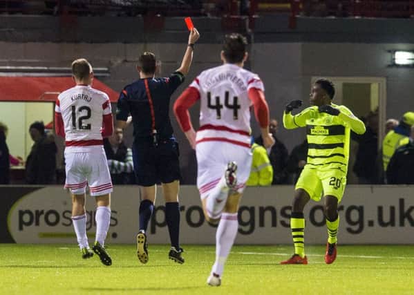 The Celtic defender was given his marching orders for a challenge on Hamilton's Carlton Morris. Picture: SNS