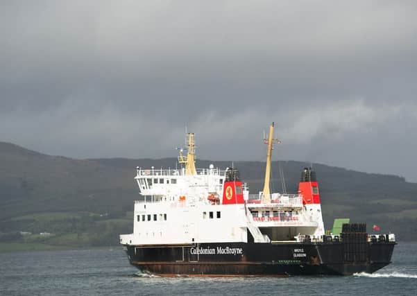 A CalMac ferry off the coast of Rothesay. The operator is in a bidding war for routes with Serco. Picture: John Devlin