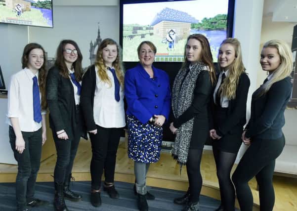 PICTURED L-R from Craigmount High, Edinburgh Kirsty Nichols 14, Chole Dickerson 15, Rebecca McLeman, Annabelle Ewing, Scottish Government Minister for Youth and Women's Employment and from Liberton High Edinburgh, Niamh Wagh 14, Sarah Hand 14, and Emma Kenner 14. Picture: Sandy Young