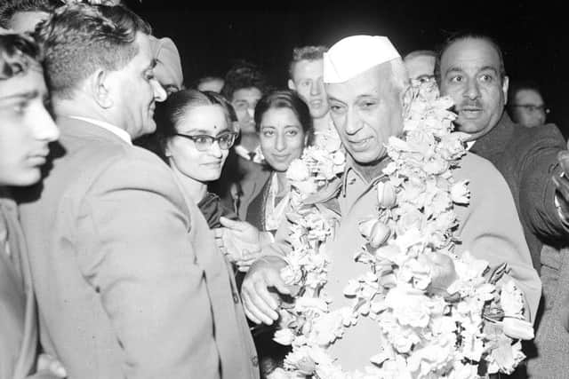 Indian prime minister Jawaharlal Nehru is welcomed to Turnhouse with garlands of flowers in 1961. Picture: TSPL