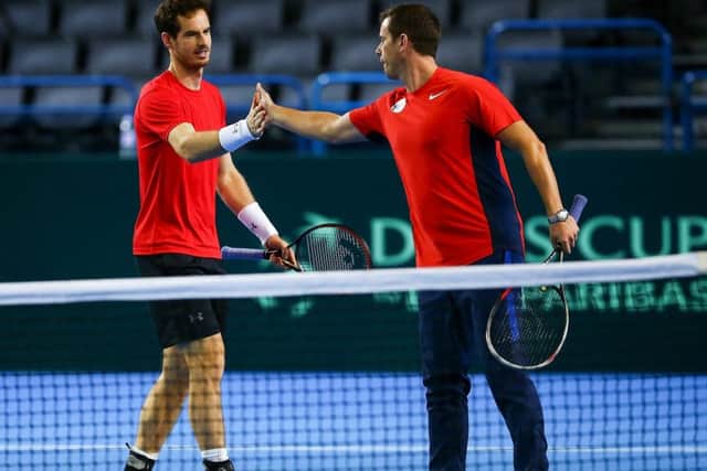Andy Murray and Great Britain captain Leon Smith during a practice session ahead of the Davis Cup tie with Japan in Birmingham. Picture: Jordan Mansfield/Getty Images for LTA