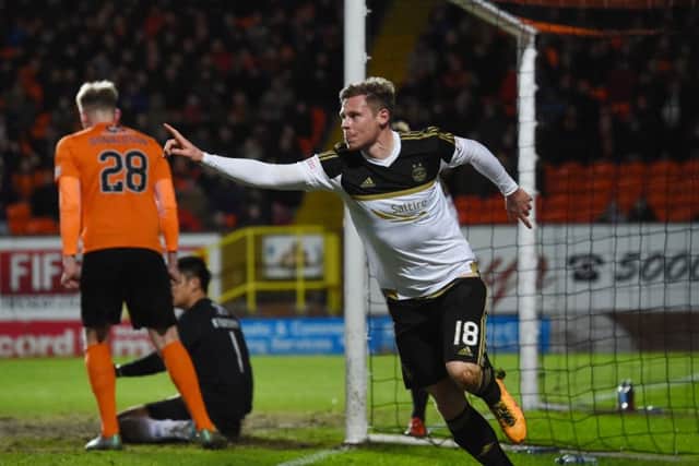 Aberdeen's Simon Church celebrates after scoring his side's winning goal. Picture: SNS