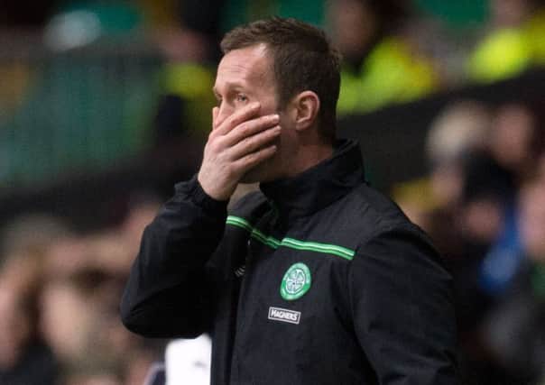Manager Ronny Deila watches on as Celtic fail to find a way past Dundee. Picture: Rob Casey/SNS