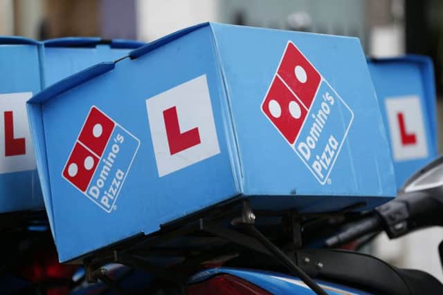 Domino's said its bottom line was helped by cheaper cheese, fuel and dough. Picture: Jonathan Brady/PA Wire