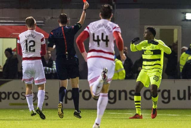 Celtic's Dedryck Boyata is sent off for a challenge on Hamilton's Carlton Morris. Picture: Craig Foy/SNS