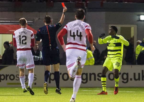 Celtic's Dedryck Boyata is sent off for a challenge on Hamilton's Carlton Morris. Picture: Craig Foy/SNS