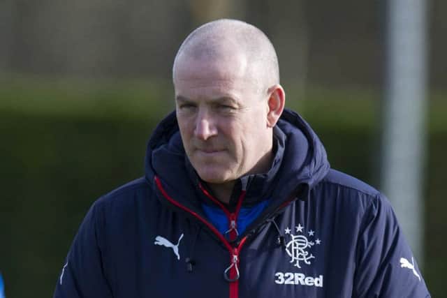 Warburton stayed at home rather than watch Dundee take on Celtic. Picture: SNS