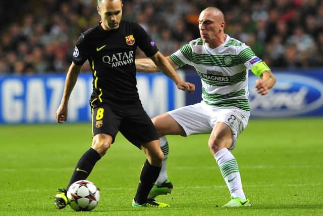 Matches like this 2013 clash between Celtic and Barcelona could become a thing of the past if the Champions League is restructured. Picture: Robert Perry