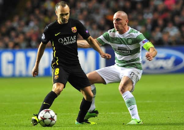 Matches like this 2013 clash between Celtic and Barcelona could become a thing of the past if the Champions League is restructured. Picture: Robert Perry